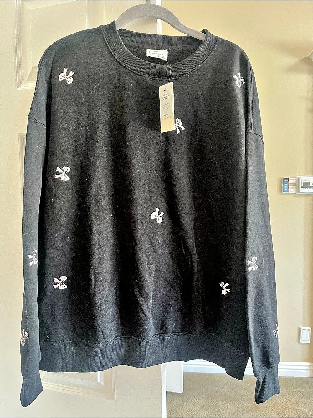 reflex Floral Embroidered Sweatshirt NWT in Black with Pink Bows
